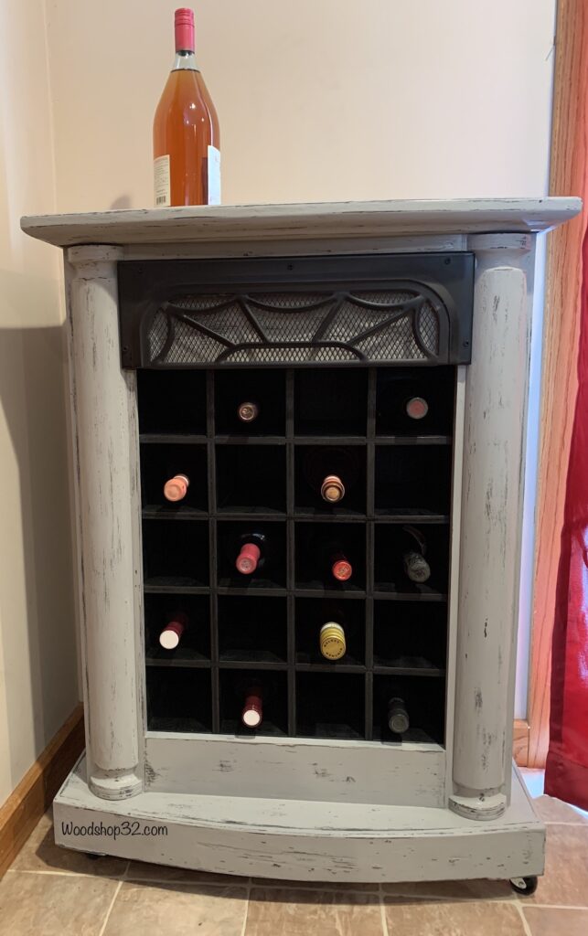 faux fireplace into a rustic wine rack