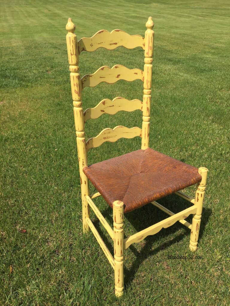 repurposed painted yellow chair with wicker seat