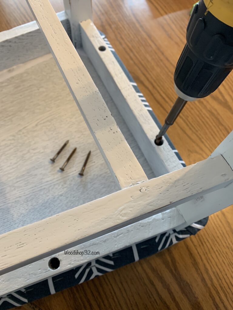 attaching upholstered seat to chair with cordless screwdriver
