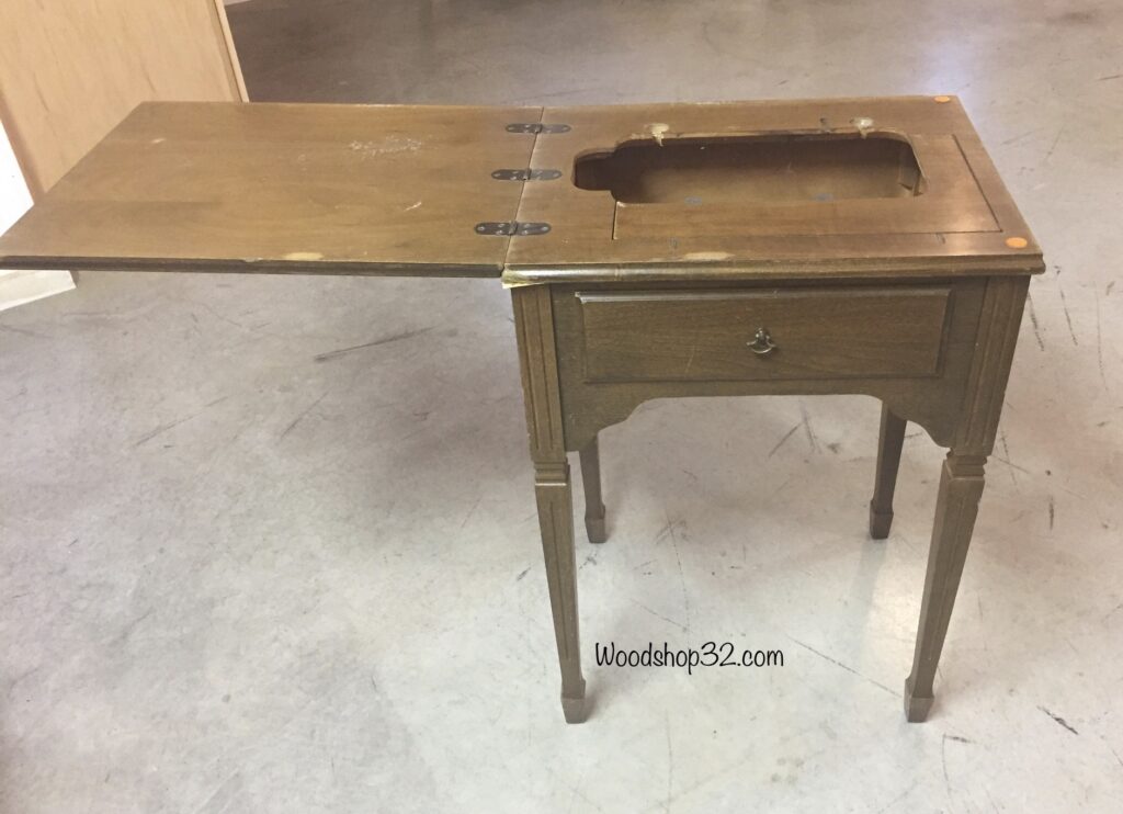 old sewing table with flip lid