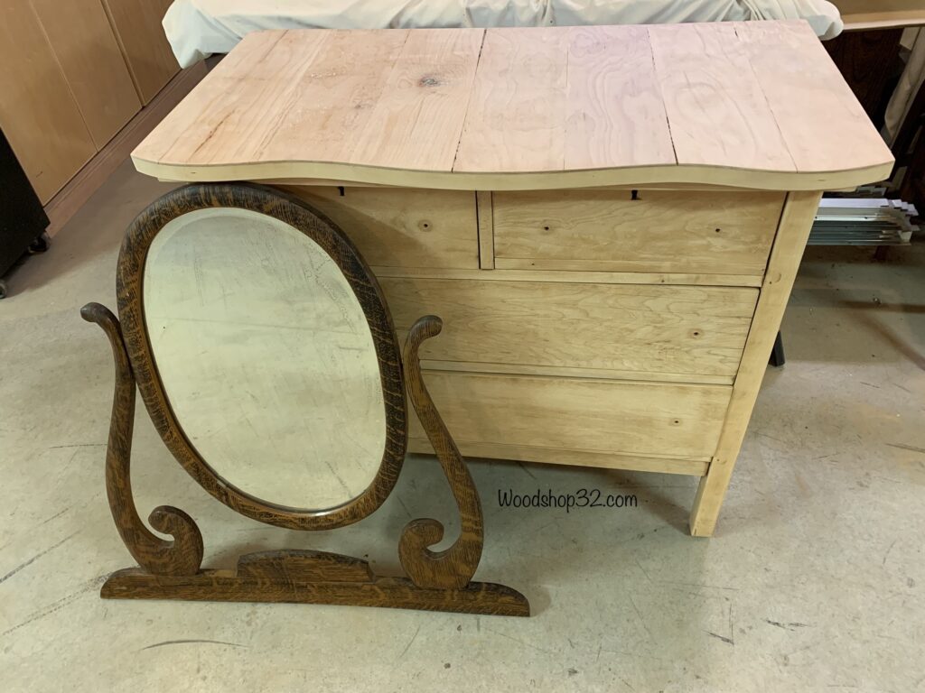 sanded antique vintage dresser next to original mirror frame