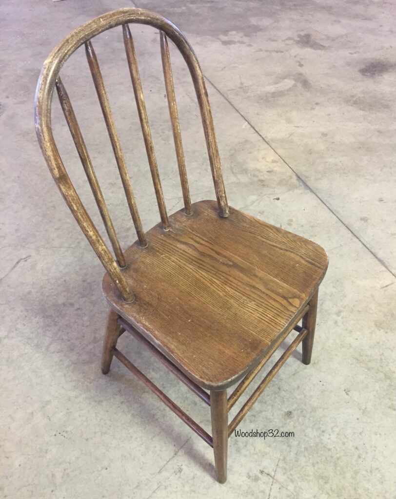 old wooden chair with curved back