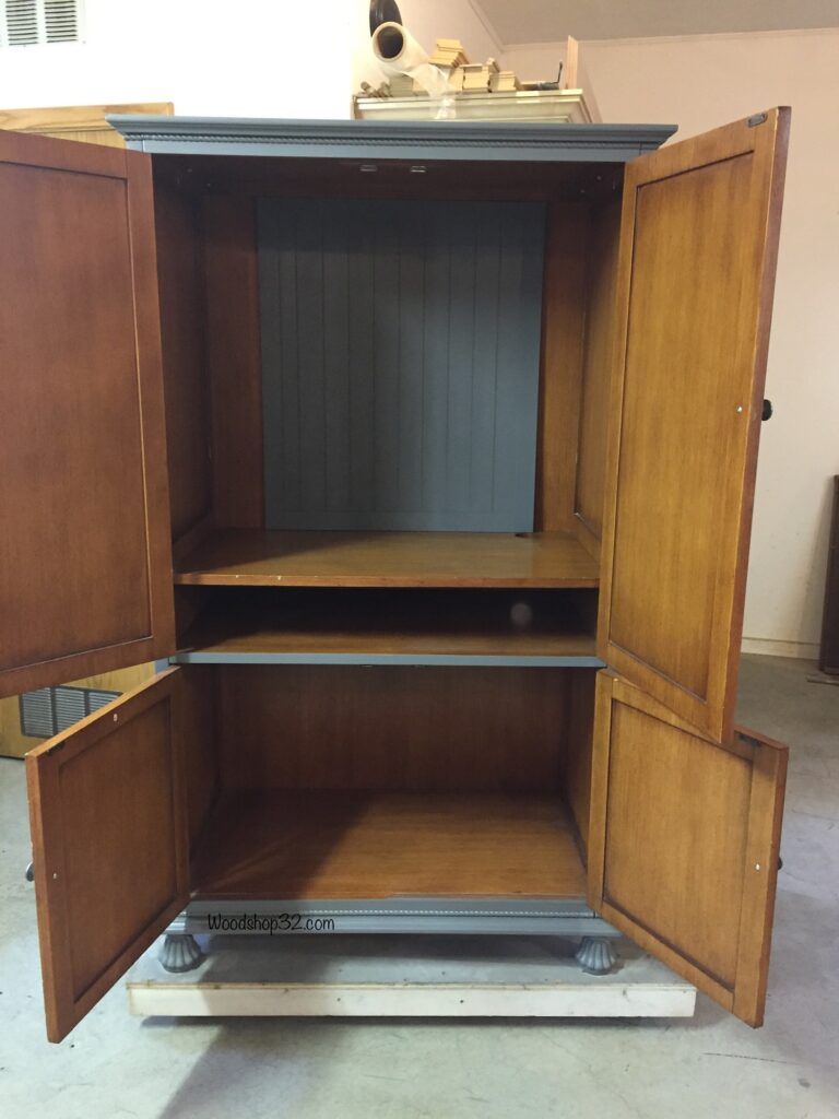 repurposed old TV armoire cabinet into a farmhouse closet or pantry with doors open