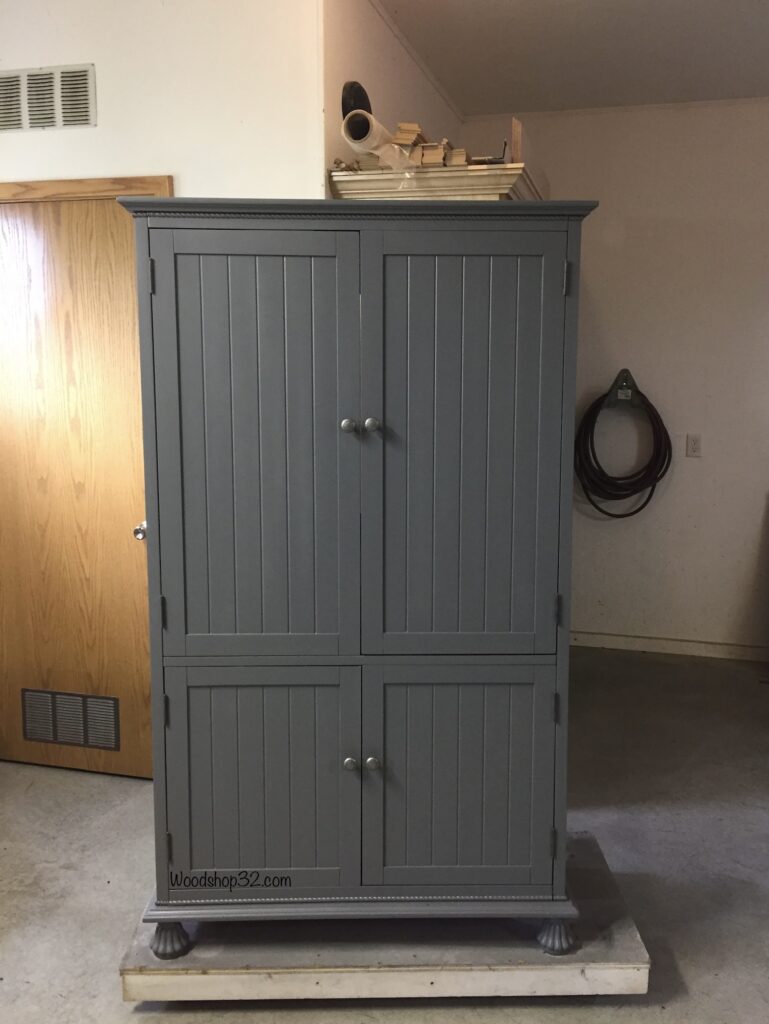 repurposed old TV armoire cabinet into a farmhouse closet or pantry