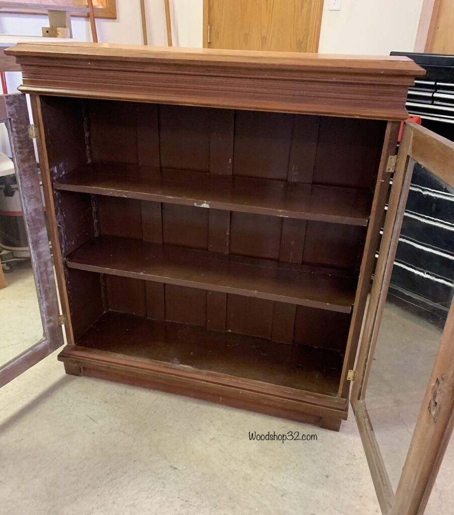 vintage display cabinet with glass doors