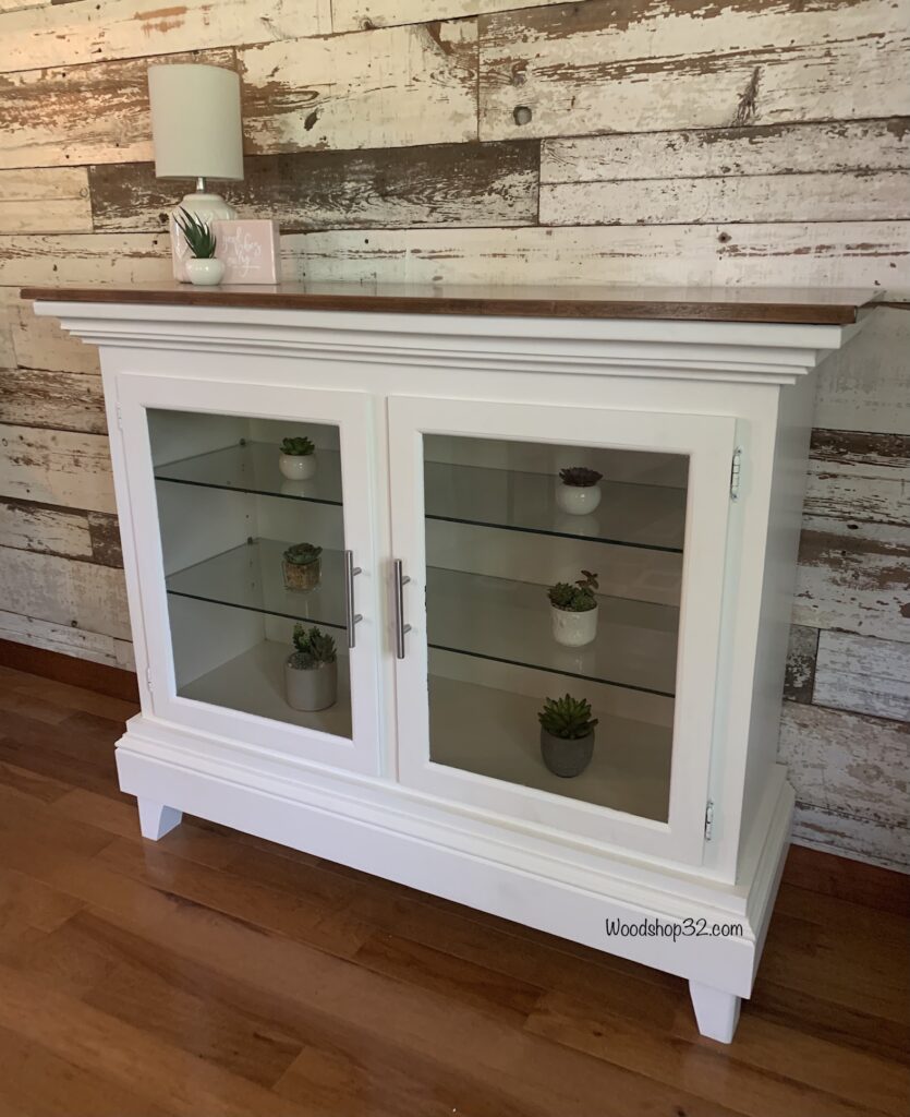 repurposed hutch painted white farmhouse style with glass doors