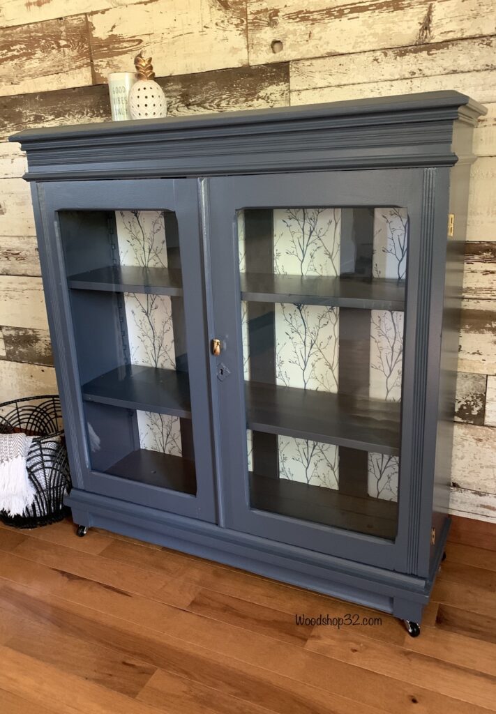 repurposed vintage display cabinet painted blue